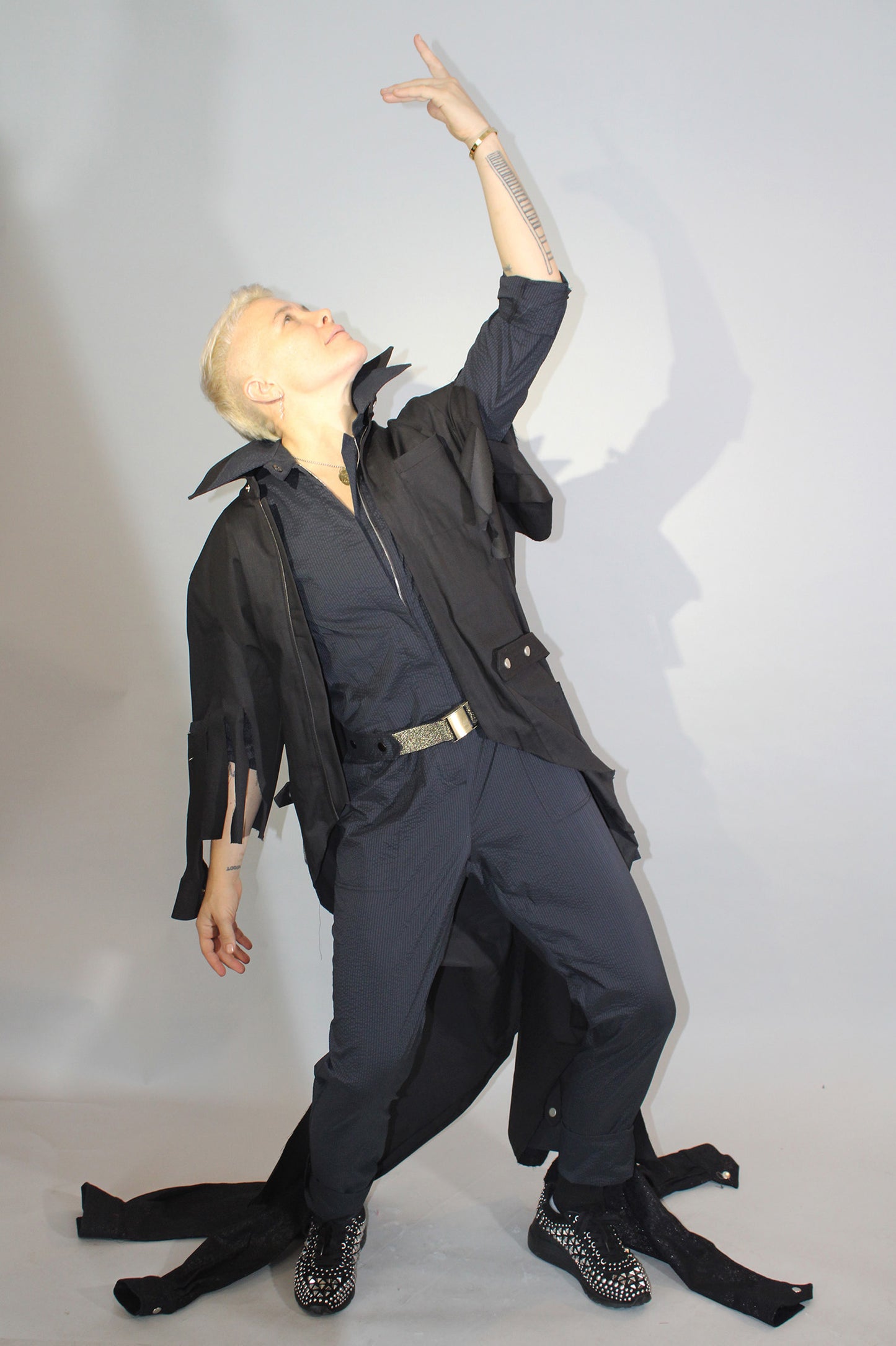 The Feminine WILDE Jumpsuit - Long Sleeve in Black Seersucker with Up-cycled "WOW" Tailcoat