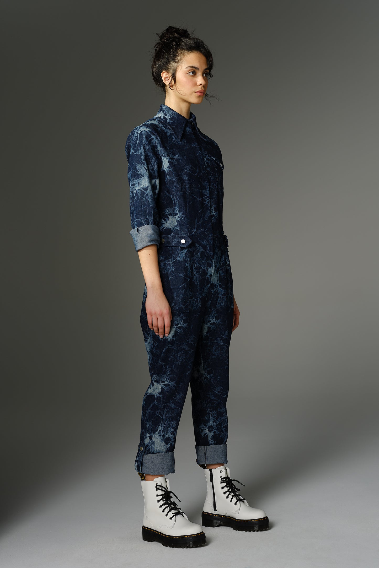 THE FEMININE WILDE Jumpsuit - Long Sleeve in Blue Splatter Print Denim