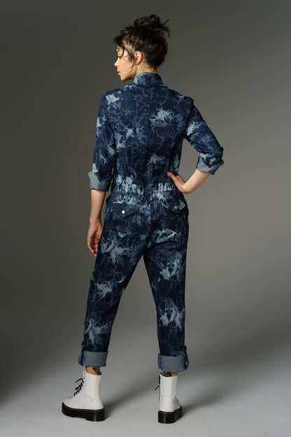 THE FEMININE WILDE Jumpsuit - Long Sleeve in Blue Splatter Print Denim