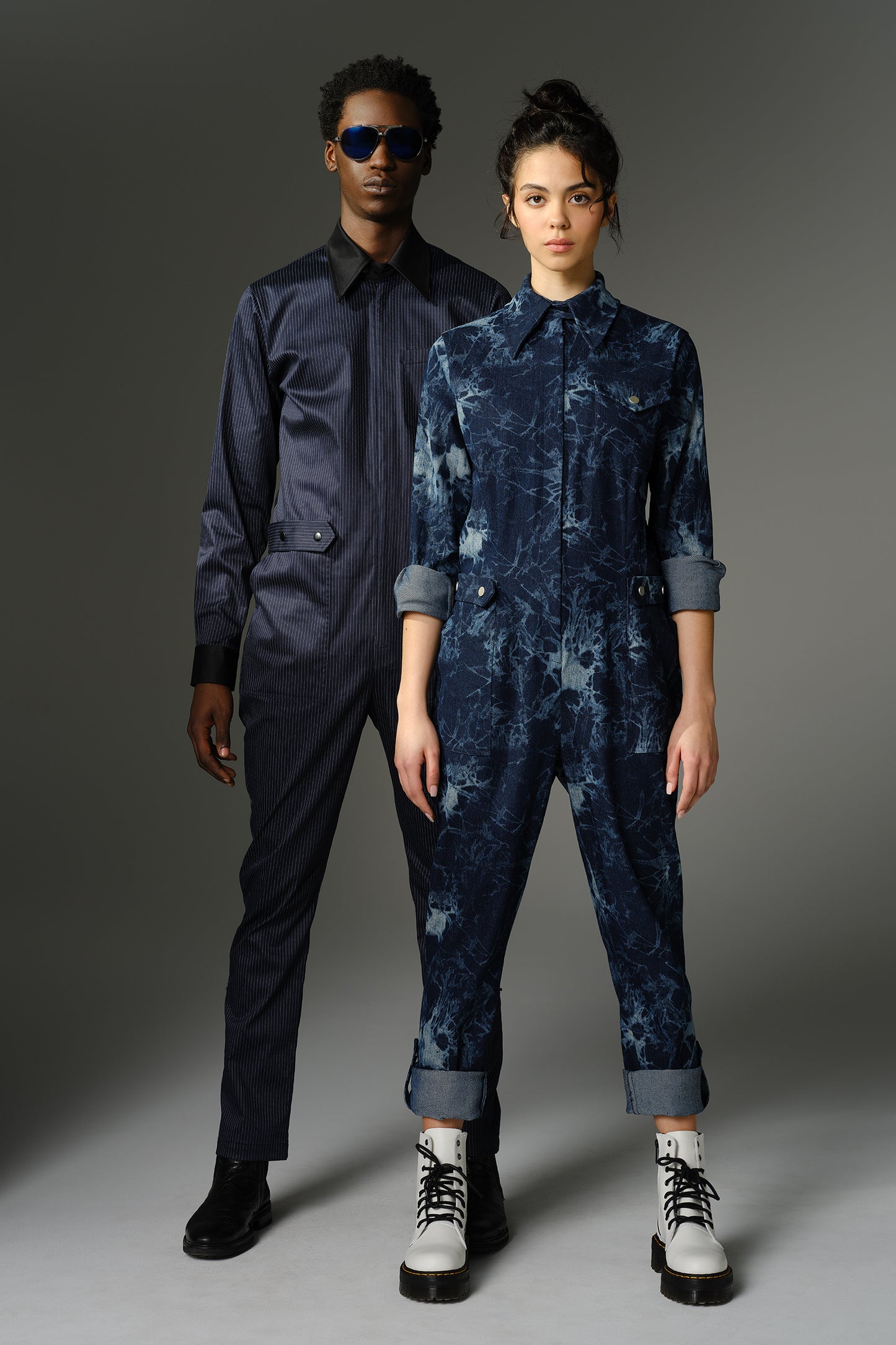 THE FEMININE WILDE Jumpsuit - Long Sleeve in Blue Splatter Print Denim