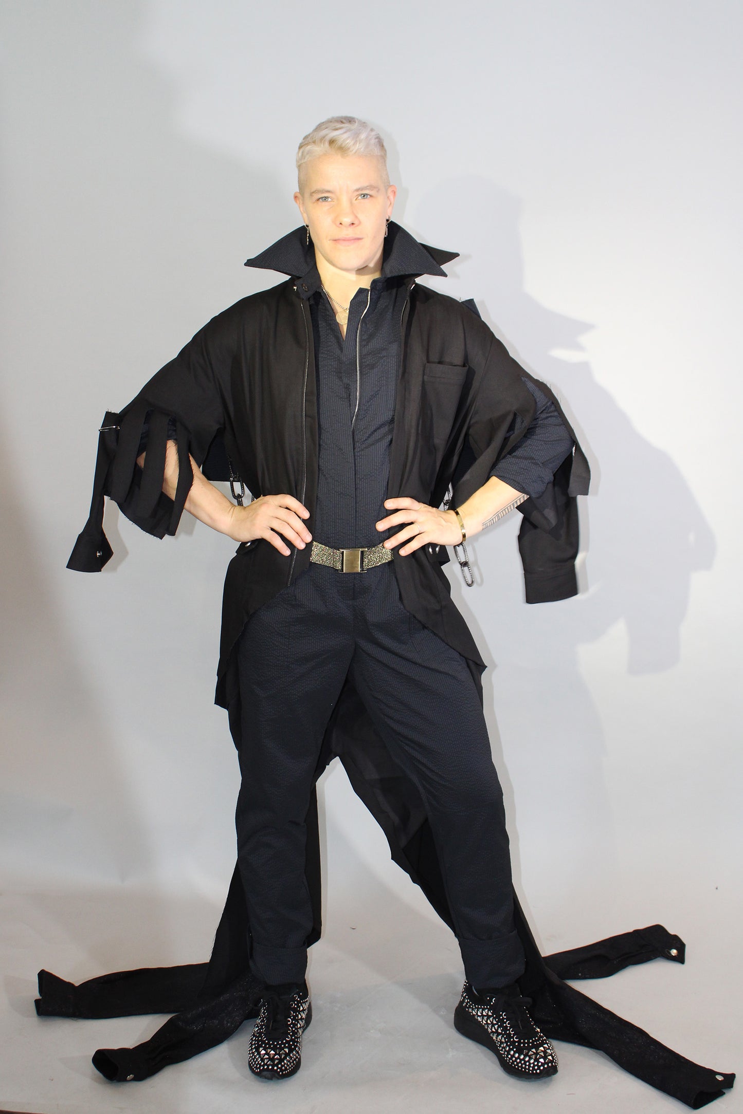 The Feminine WILDE Jumpsuit - Long Sleeve in Black Seersucker with Up-cycled "WOW" Tailcoat